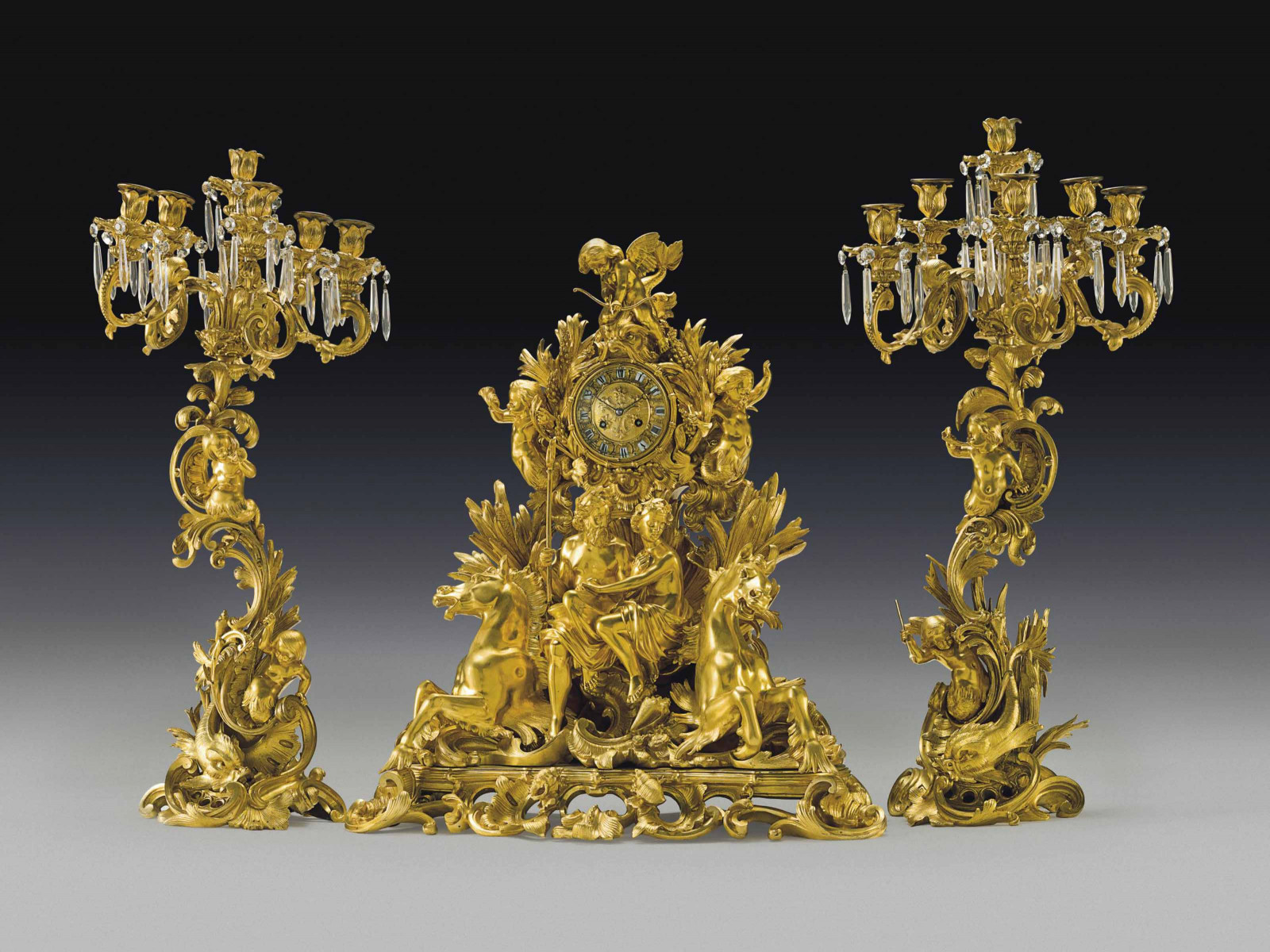 2013_NYR_02695_0004_000(a_napoleon_iii_ormolu_and_cut-glass_three-piece_clock_garniture_third123727)(1).jpg