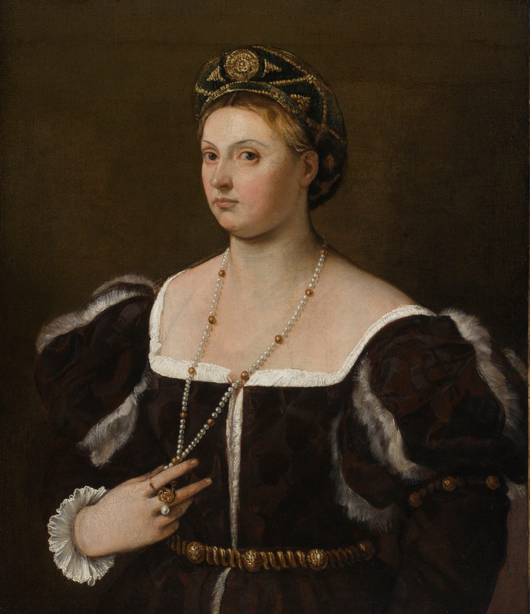 8 Attributed to Tiziano Vecellio, called Titian A PORTRAIT OF A LADY, HALF LENGTH, DRESSED IN A DAMASK, FUR-LINED GOWN WITH A GOLD CINTA AND GREEN AND GOLD BALZO.jpg